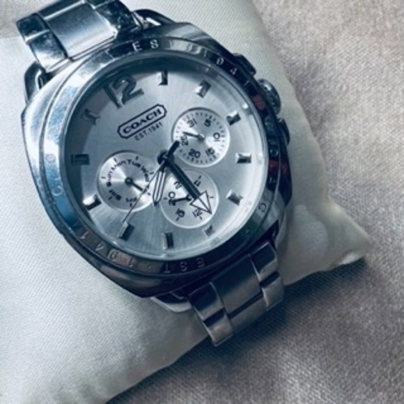 COACH women’s stainless steel women’s watch.